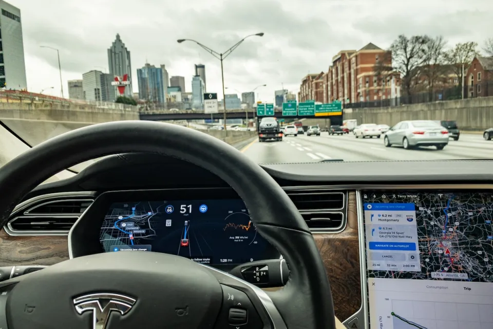 Tesla self-driving car view from inside dashboard.